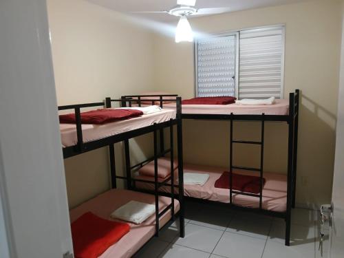 Postel nebo postele na pokoji v ubytování Apê - Parque Industrial - SJC - SP