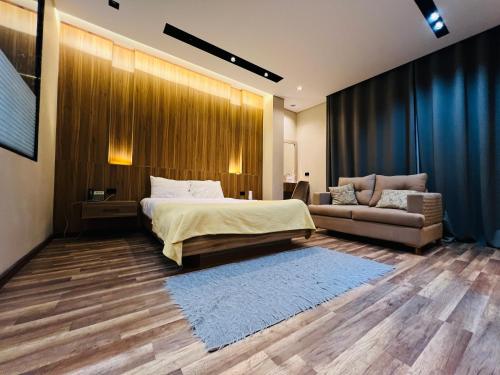 Ένα ή περισσότερα κρεβάτια σε δωμάτιο στο Farida Grand Hotel