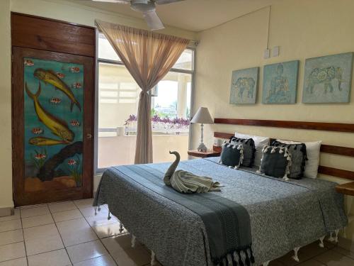 Postel nebo postele na pokoji v ubytování Casa Piedra Parada