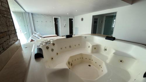 Koupelna v ubytování Apartamento duplex em Itaipava com vaga