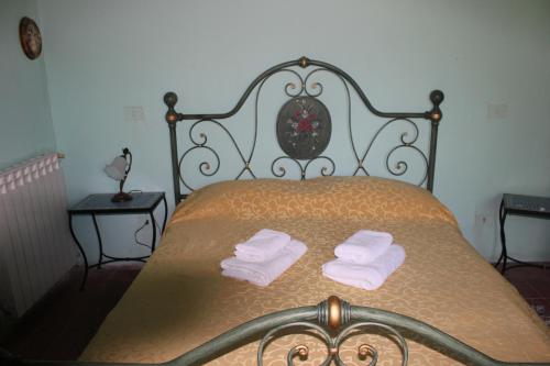 Postel nebo postele na pokoji v ubytování La dimora di Anna