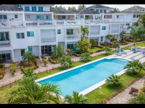 Bazén v ubytování Rayo de sol condominio la Fenice nebo v jeho okolí