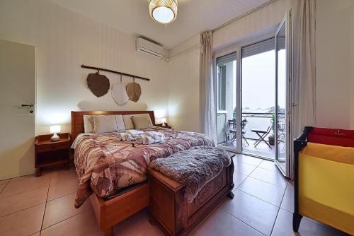 Ένα ή περισσότερα κρεβάτια σε δωμάτιο στο Appartamento Bellavista Milano -Monza-Como -Svizzera