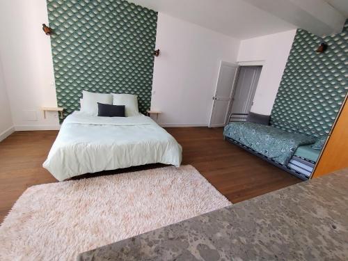 Ένα ή περισσότερα κρεβάτια σε δωμάτιο στο Gite Morvan