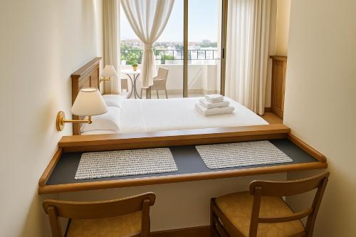 Ένα ή περισσότερα κρεβάτια σε δωμάτιο στο TatyHouse