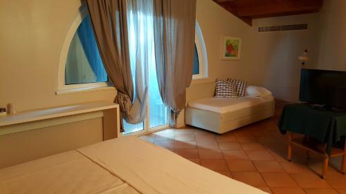 Hotel Augustusにあるベッド