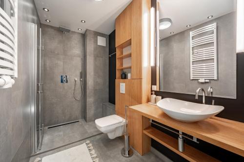 Ένα μπάνιο στο Konstelacja Gwiazd Apartament
