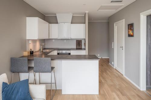 Η κουζίνα ή μικρή κουζίνα στο High-end apartment in Trondheim