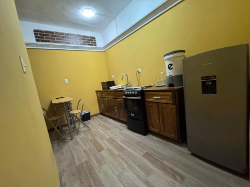 Η κουζίνα ή μικρή κουζίνα στο Apartamentos Casa Marco Polo