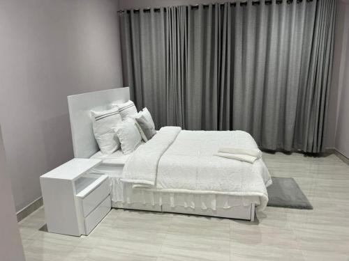 Postel nebo postele na pokoji v ubytování Create Investments