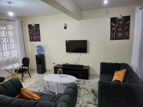 Et tv og/eller underholdning på Zariah Homes 2