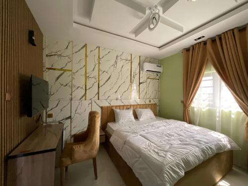 Ένα ή περισσότερα κρεβάτια σε δωμάτιο στο Rama Garden Hotel ,Lafe Rd, Akure