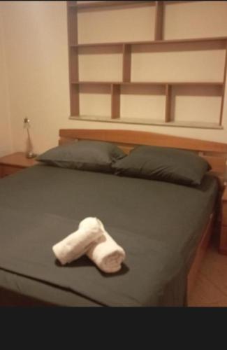 Llit o llits en una habitació de Central apartment A&E