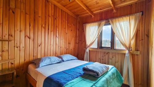 Postel nebo postele na pokoji v ubytování Ocho Aguilas Eco Lodge