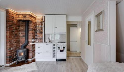 Foto Wooden studio with parking near Aura river 1