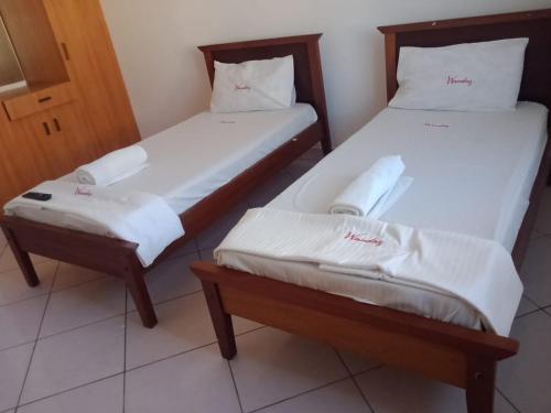 Ένα ή περισσότερα κρεβάτια σε δωμάτιο στο Cosy ensuite room,in a spacious apartment near CBD TF1