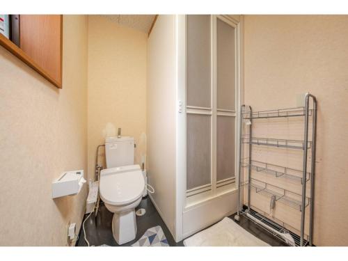 a bathroom with a white toilet in a room at Easy Stay - Vacation STAY 20386 in Harada