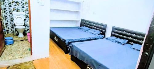 Postel nebo postele na pokoji v ubytování Maa jamwanti homestay