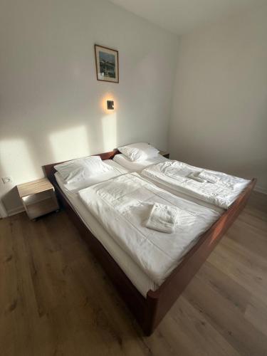 Ένα ή περισσότερα κρεβάτια σε δωμάτιο στο Hotel Haus Schwan Köln