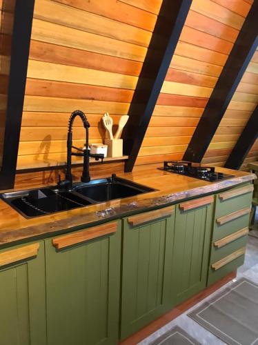 Kuchyň nebo kuchyňský kout v ubytování Chalé Recanto das Águas