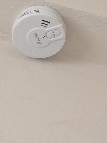 a white ceiling thermometer on a ceiling at Mitropoli's Home in Leonidion