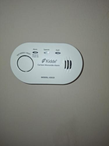 a close up of a remote control on a ceiling at Mitropoli's Home in Leonidion