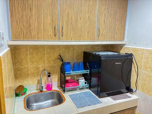 Kuchyň nebo kuchyňský kout v ubytování Studio Room In Kelantan Trade Centre