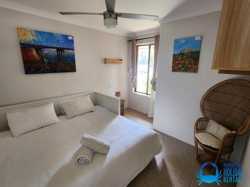 Ένα ή περισσότερα κρεβάτια σε δωμάτιο στο Falcon Patch Hollow Holiday Home