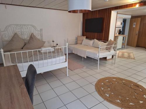 Ένα ή περισσότερα κρεβάτια σε δωμάτιο στο Rheinperle - Feel at home Entire apartment