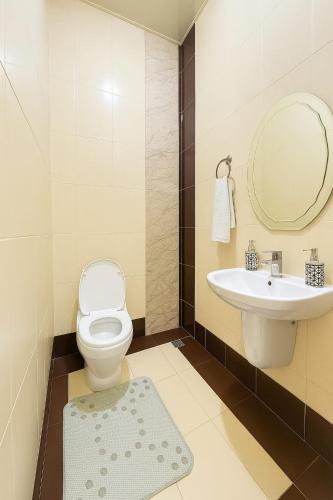 ห้องน้ำของ Veluna Apartments