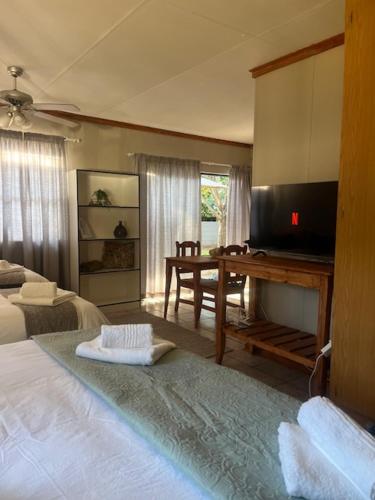 Postel nebo postele na pokoji v ubytování Compass Overnight Langenhovenpark