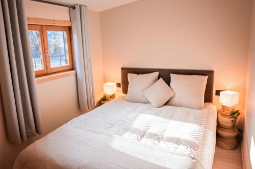 Postel nebo postele na pokoji v ubytování Maison nature, ski, randos