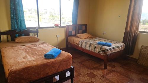 Ένα ή περισσότερα κρεβάτια σε δωμάτιο στο La Magia del Colibrí