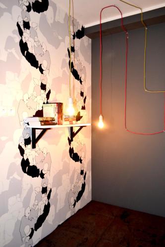 a wall mural in a room with a table at Studio Praga in Warsaw