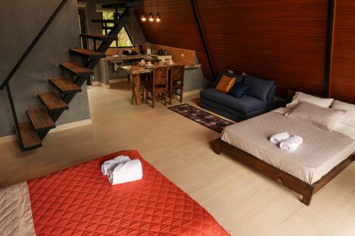 Ένα ή περισσότερα κρεβάτια σε δωμάτιο στο Guayacanes Ecolodge