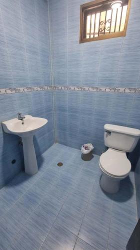 Koupelna v ubytování Amplío Hogar Cerca del Sambil