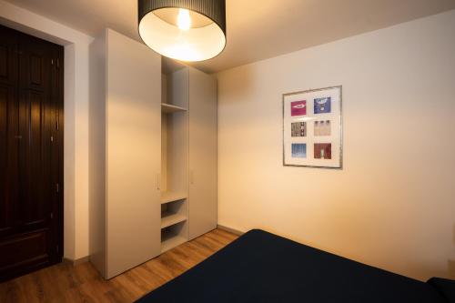 Postel nebo postele na pokoji v ubytování Domus Acaja