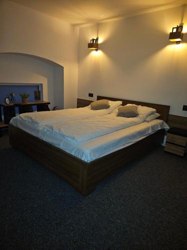 Postel nebo postele na pokoji v ubytování Sewi 2- Kastalia