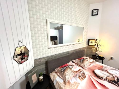 Postel nebo postele na pokoji v ubytování Nilton Apartmans