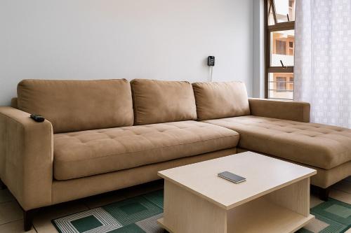 Et opholdsområde på Luxury Modern Apartment