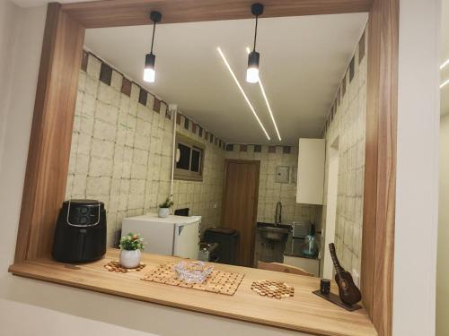 a view of a kitchen with a counter in a room at Tahrir apartments in Cairo