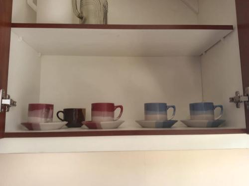 Tetera y cafetera en Entire apartment in Ambato Ficoa