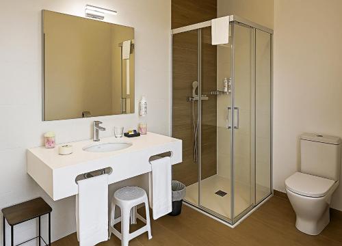 Koupelna v ubytování Hotel Entrerailes