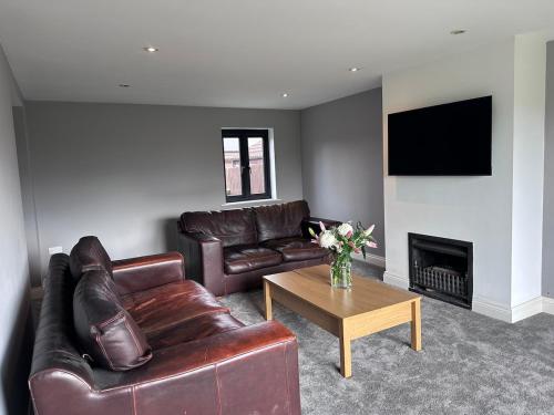 TV a/nebo společenská místnost v ubytování The White House Kelfield