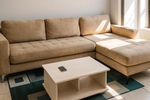 Et opholdsområde på Luxury Modern Apartment