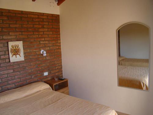 Postel nebo postele na pokoji v ubytování Apartments Fazenda Solares