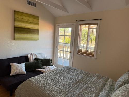 Ένα ή περισσότερα κρεβάτια σε δωμάτιο στο Les Délices Maison