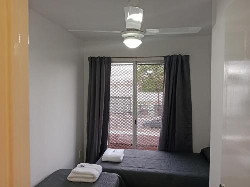 Ένα ή περισσότερα κρεβάτια σε δωμάτιο στο Yes Apartment