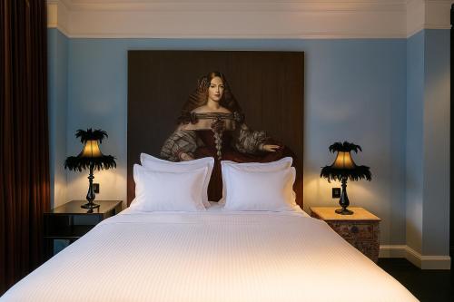 Ένα ή περισσότερα κρεβάτια σε δωμάτιο στο בוטיק רוטשילד תל אביב