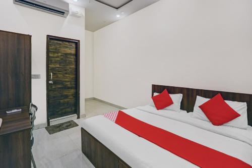 Postel nebo postele na pokoji v ubytování Hotel O Prince